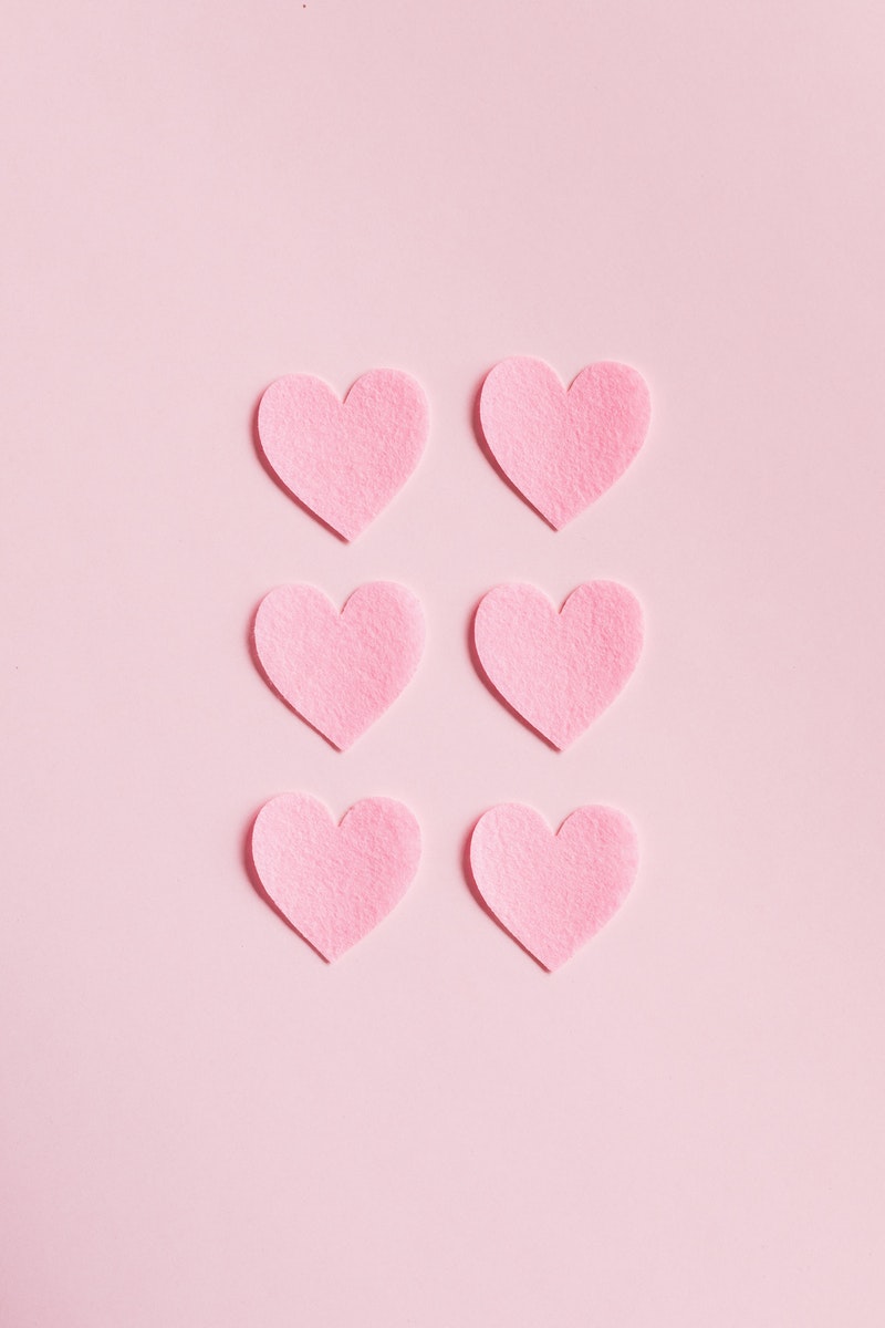 Heart Shaped Cutouts on Pink Background