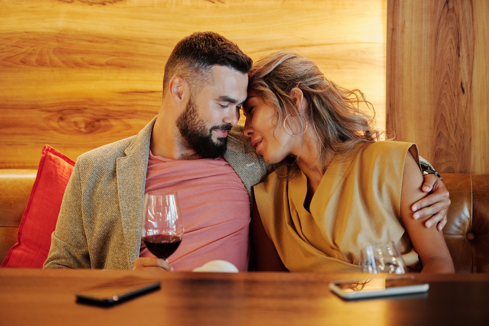 A Loving Couple Drinking Wine in a Restaurant