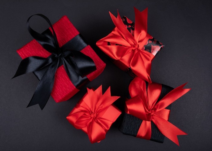 red ribbon on black textile