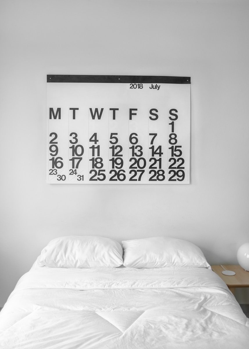 white 2018 July calendar on the wall